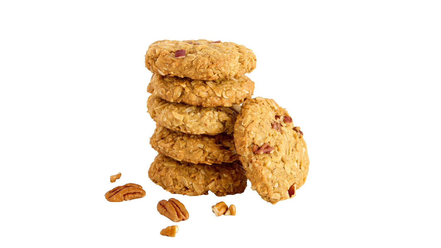 A stack of golden-brown oatmeal cookies with a few scattered pecans on a plain white background.