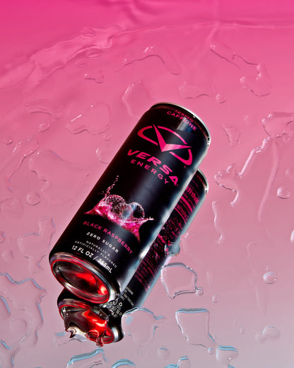 Versa Energy drink can on a pink background with water droplets